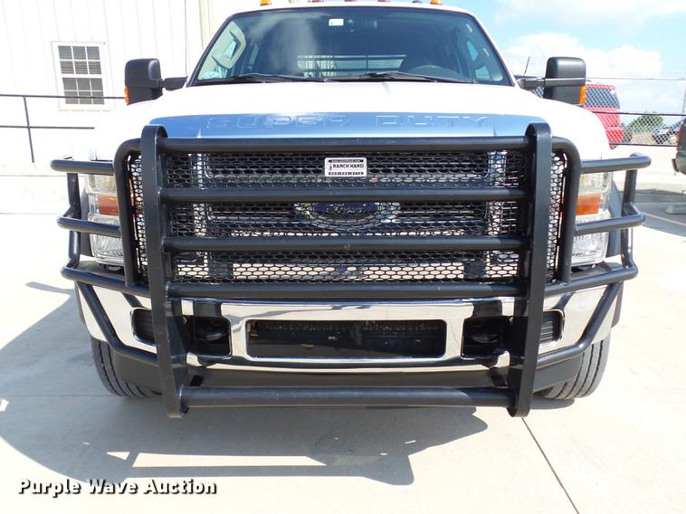 image for item DB4201 2009 Ford F450 Super Duty XLT Crew Cab flatbed truck
