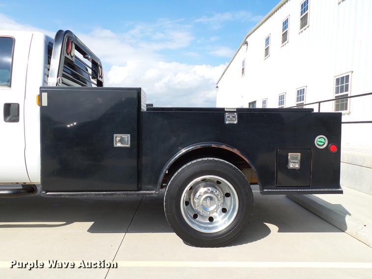 image for item DB4201 2009 Ford F450 Super Duty XLT Crew Cab flatbed truck
