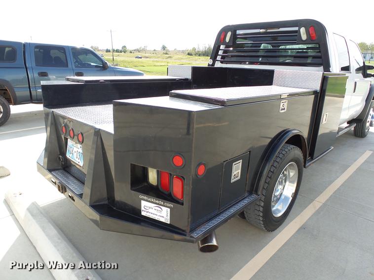 image for item DB4201 2009 Ford F450 Super Duty XLT Crew Cab flatbed truck