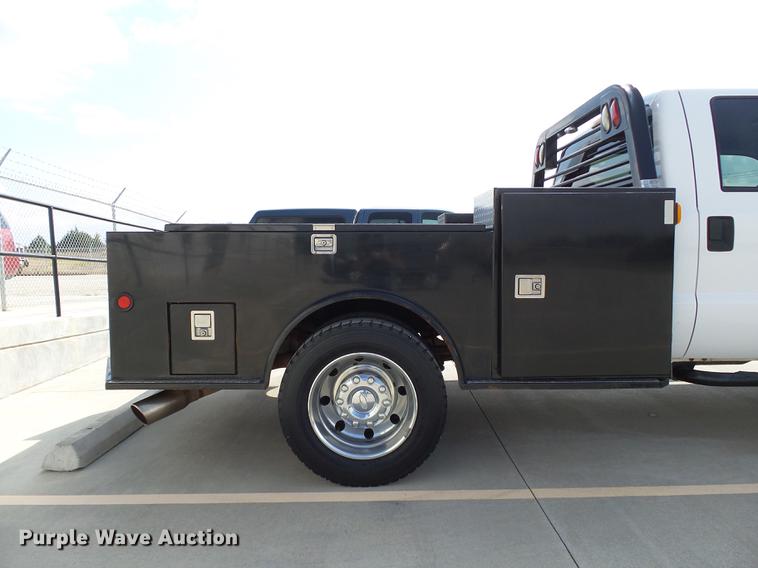 image for item DB4201 2009 Ford F450 Super Duty XLT Crew Cab flatbed truck