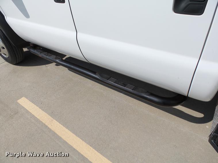 image for item DB4201 2009 Ford F450 Super Duty XLT Crew Cab flatbed truck