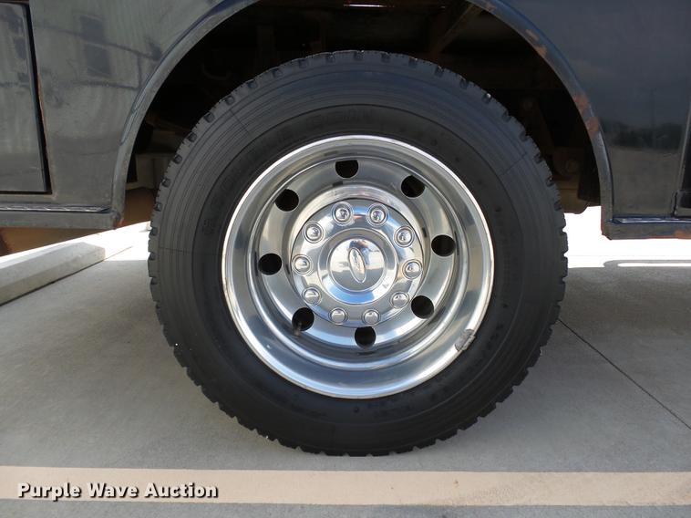 image for item DB4201 2009 Ford F450 Super Duty XLT Crew Cab flatbed truck