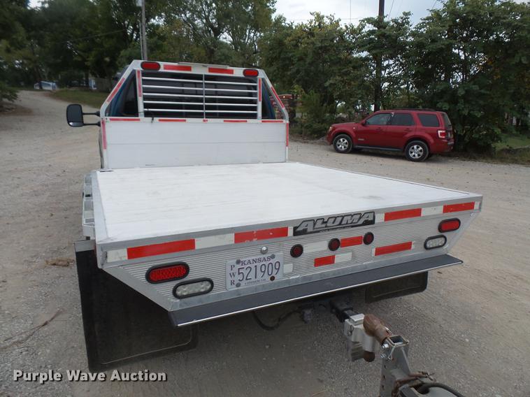 image for item DC5311 2000 Ford F350 Super Duty SuperCab flatbed pickup truck