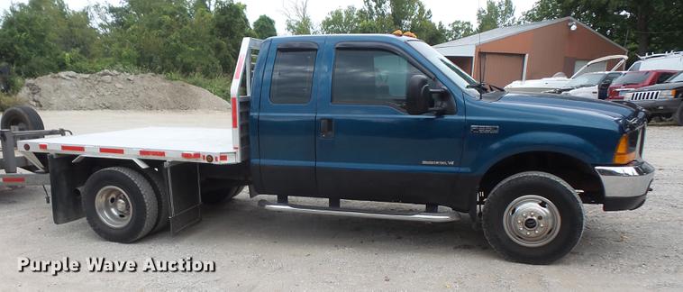 image for item DC5311 2000 Ford F350 Super Duty SuperCab flatbed pickup truck