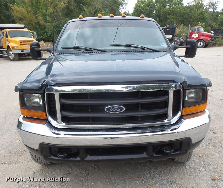 image for item DC5311 2000 Ford F350 Super Duty SuperCab flatbed pickup truck