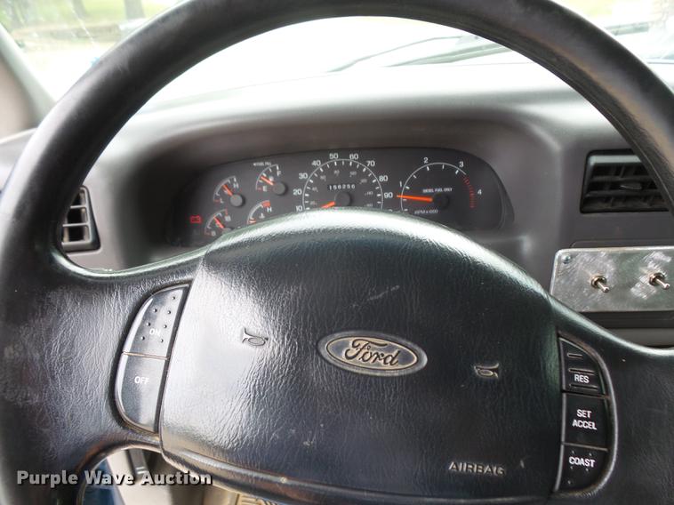 image for item DC5311 2000 Ford F350 Super Duty SuperCab flatbed pickup truck