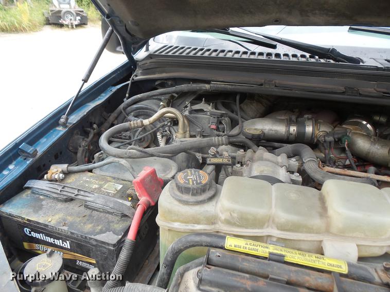 image for item DC5311 2000 Ford F350 Super Duty SuperCab flatbed pickup truck