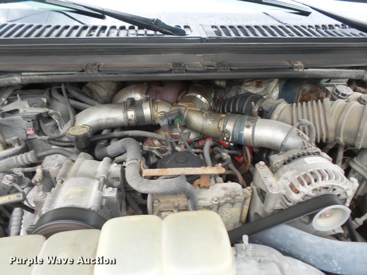 image for item DC5311 2000 Ford F350 Super Duty SuperCab flatbed pickup truck