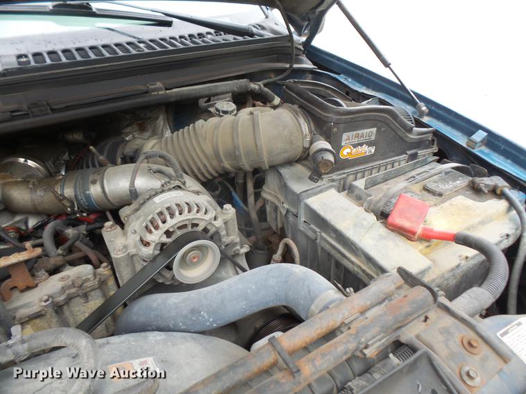 image for item DC5311 2000 Ford F350 Super Duty SuperCab flatbed pickup truck