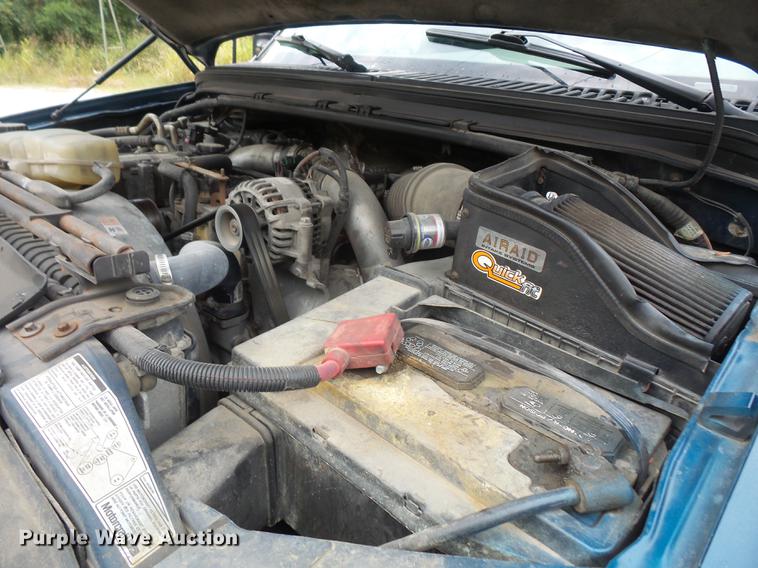 image for item DC5311 2000 Ford F350 Super Duty SuperCab flatbed pickup truck