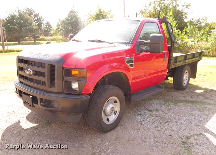 image for item DI9872 2009 Ford F250 Super Duty flatbed pickup truck