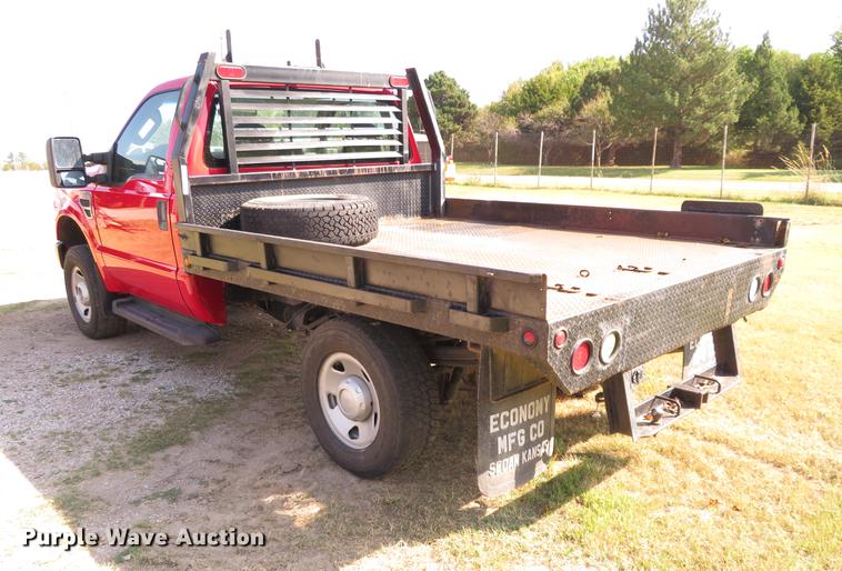 image for item DI9872 2009 Ford F250 Super Duty flatbed pickup truck