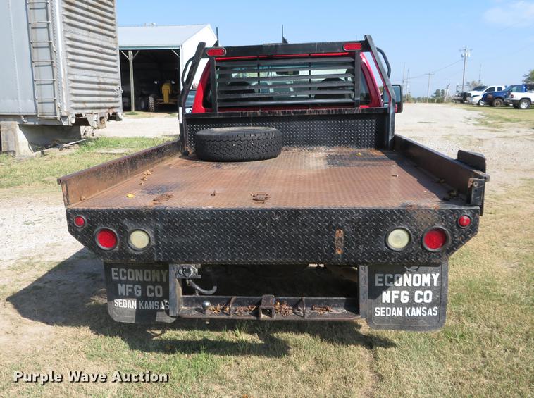 image for item DI9872 2009 Ford F250 Super Duty flatbed pickup truck