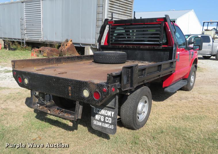 image for item DI9872 2009 Ford F250 Super Duty flatbed pickup truck