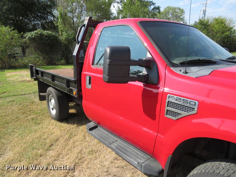 image for item DI9872 2009 Ford F250 Super Duty flatbed pickup truck