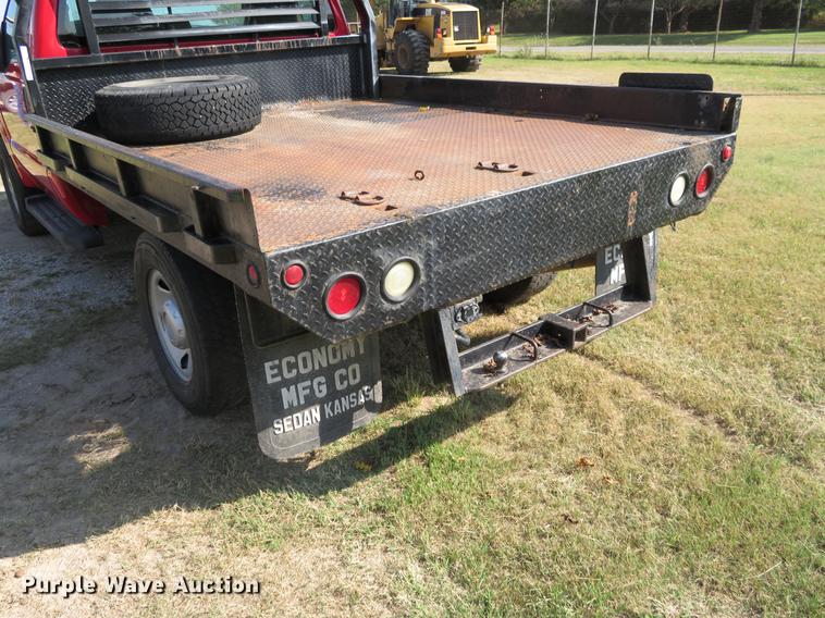 image for item DI9872 2009 Ford F250 Super Duty flatbed pickup truck
