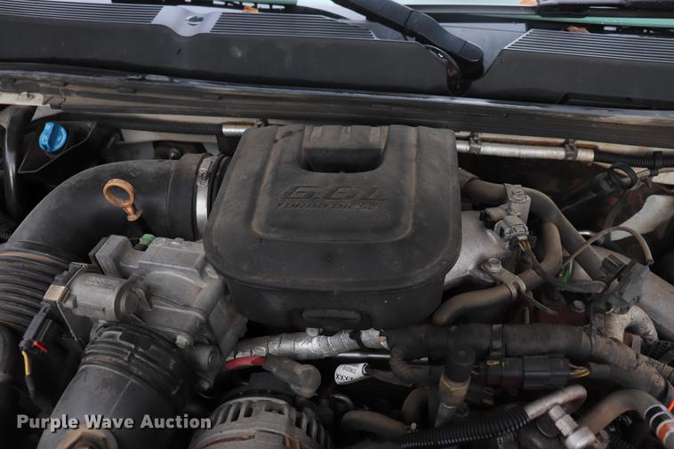 image for item ED9506 2012 Chevrolet Silverado 3500HD Crew Cab flatbed pickup truck