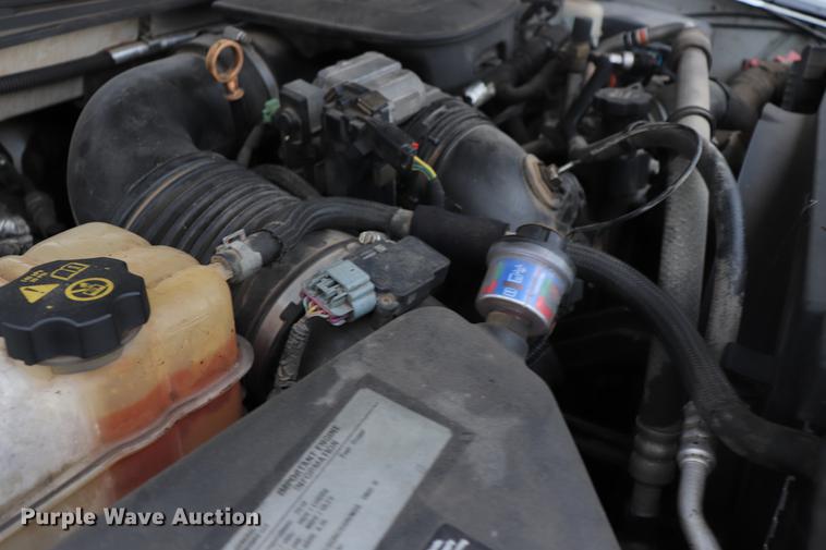 image for item ED9506 2012 Chevrolet Silverado 3500HD Crew Cab flatbed pickup truck