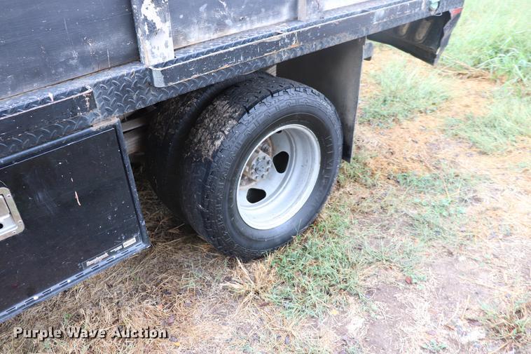 image for item ED9506 2012 Chevrolet Silverado 3500HD Crew Cab flatbed pickup truck