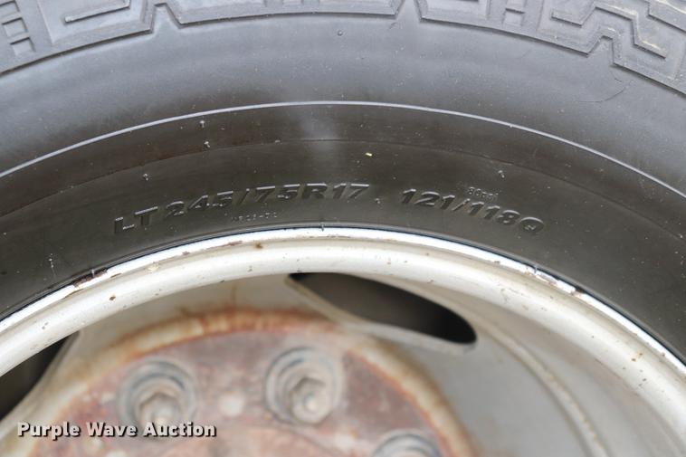 image for item ED9506 2012 Chevrolet Silverado 3500HD Crew Cab flatbed pickup truck