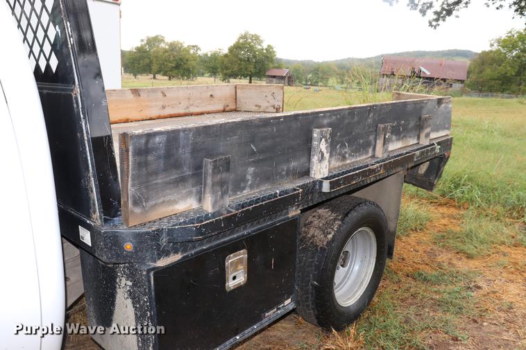 image for item ED9506 2012 Chevrolet Silverado 3500HD Crew Cab flatbed pickup truck