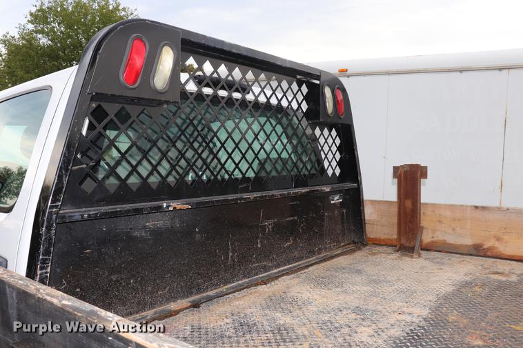 image for item ED9506 2012 Chevrolet Silverado 3500HD Crew Cab flatbed pickup truck