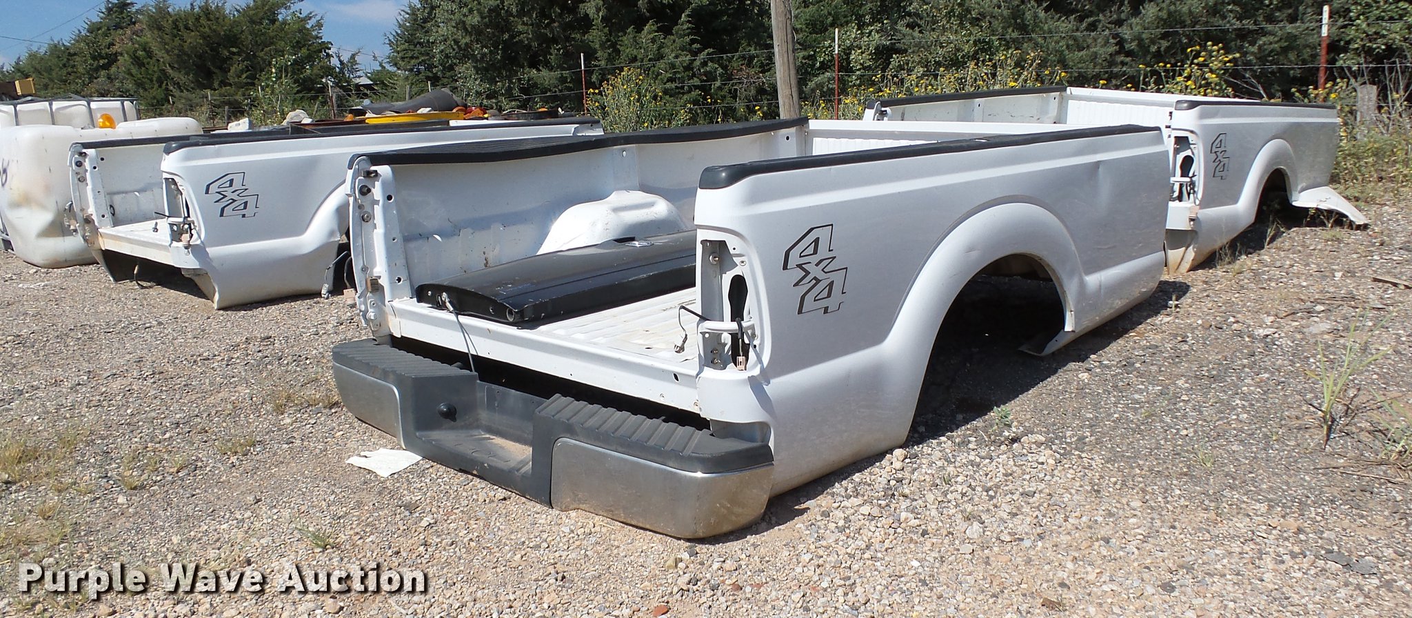 (3) Ford pickup truck beds in Edmond, OK Item AO9399 sold Purple Wave