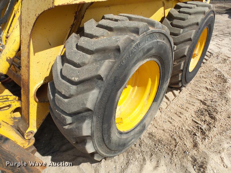 image for item DB4173 2005 John Deere 317 skid steer