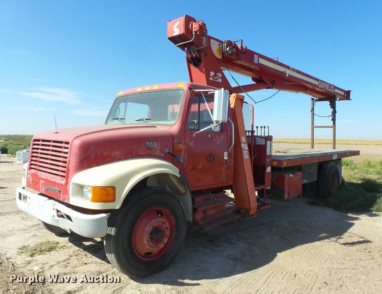 image for item DC3854 1997 International 4700 crane truck