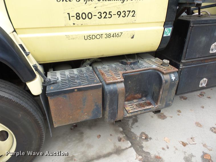 image for item DD2043 2002 GMC 7500 vacuum truck