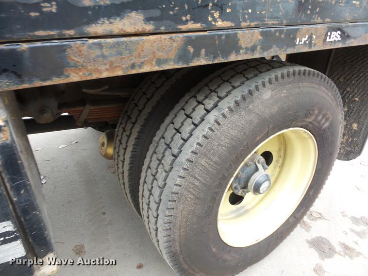 image for item DD2043 2002 GMC 7500 vacuum truck