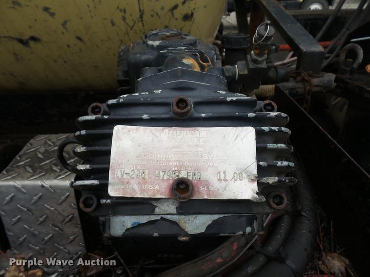 image for item DD2043 2002 GMC 7500 vacuum truck