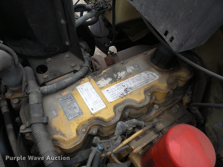 image for item DD2043 2002 GMC 7500 vacuum truck