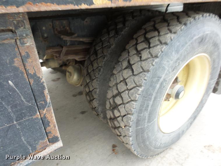 image for item DD2048 1998 GMC C7500 vacuum truck