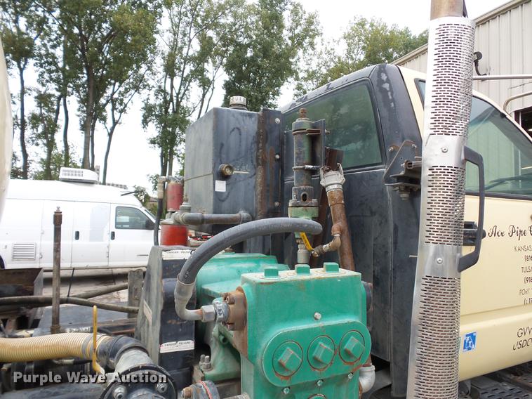 image for item DD2048 1998 GMC C7500 vacuum truck