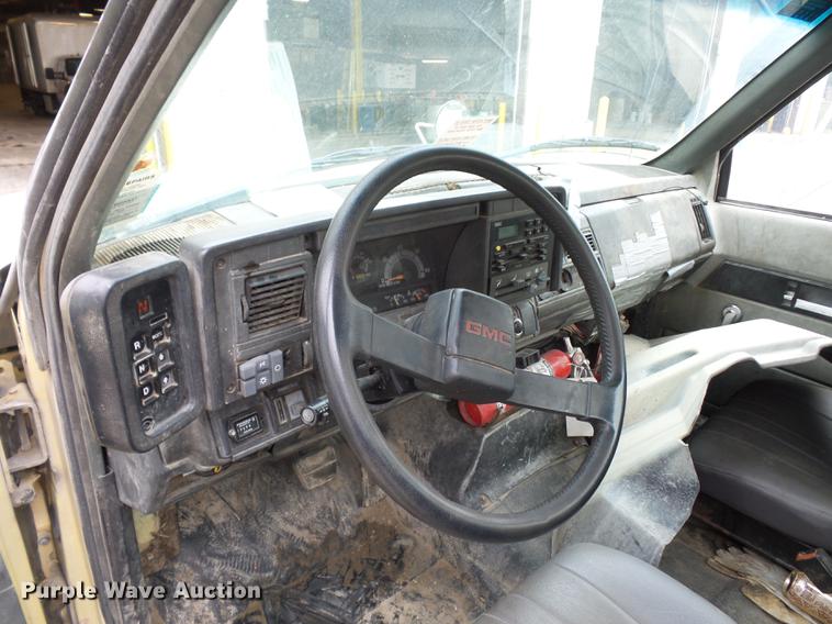 image for item DD2048 1998 GMC C7500 vacuum truck