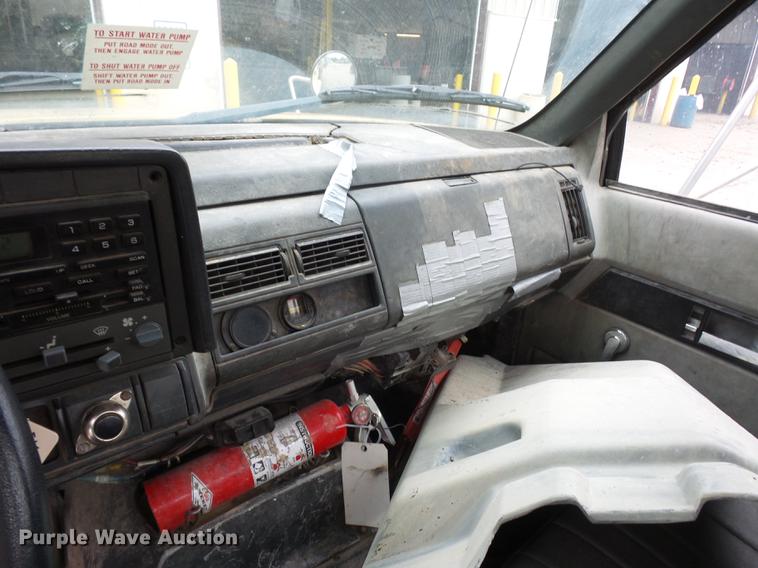 image for item DD2048 1998 GMC C7500 vacuum truck