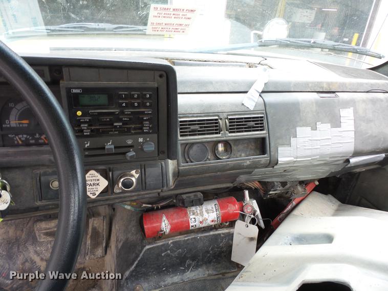 image for item DD2048 1998 GMC C7500 vacuum truck
