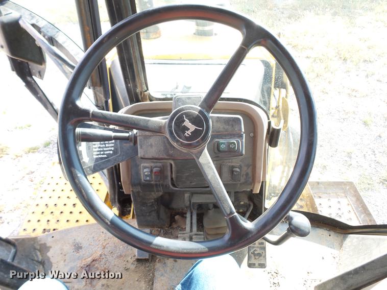 image for item DD2118 1997 John Deere 310E backhoe