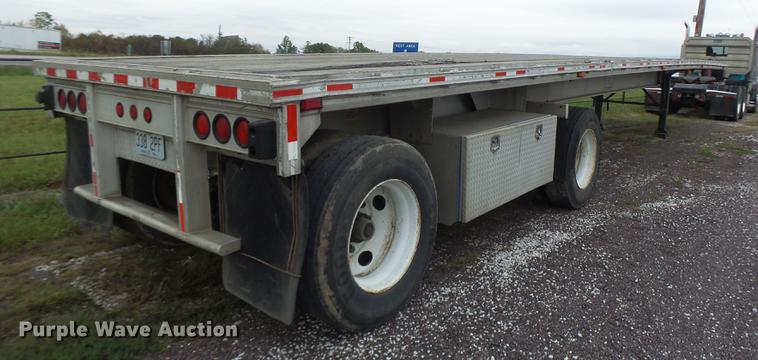 image for item DB9997 1990 East flatbed trailer