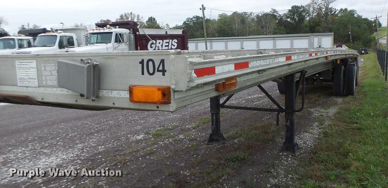 image for item DB9997 1990 East flatbed trailer