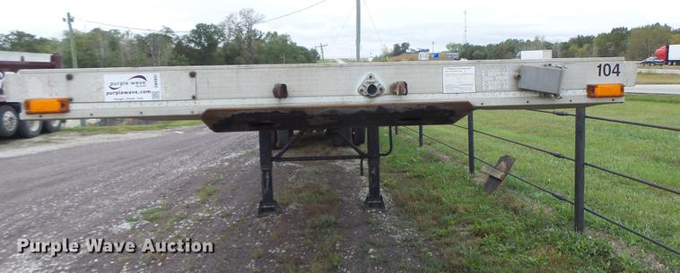 image for item DB9997 1990 East flatbed trailer