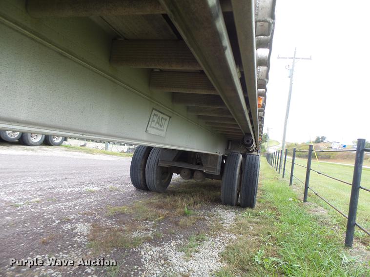 image for item DB9997 1990 East flatbed trailer