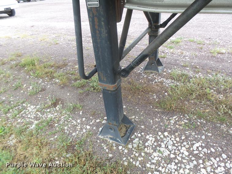 image for item DB9997 1990 East flatbed trailer