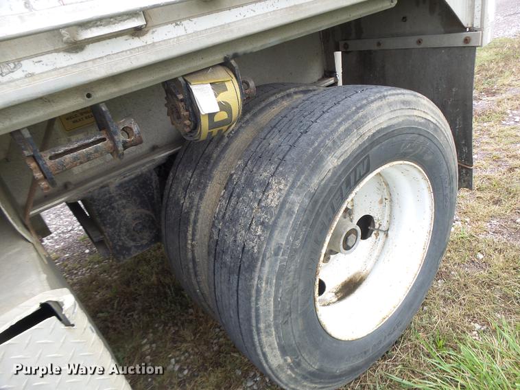 image for item DB9997 1990 East flatbed trailer