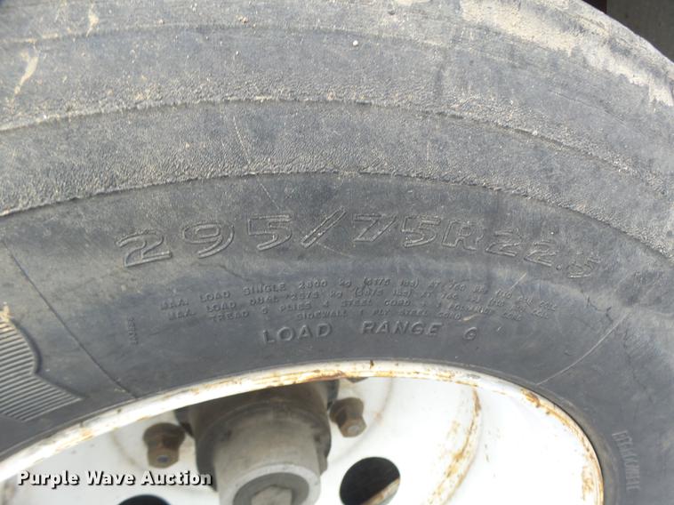 image for item DB9997 1990 East flatbed trailer