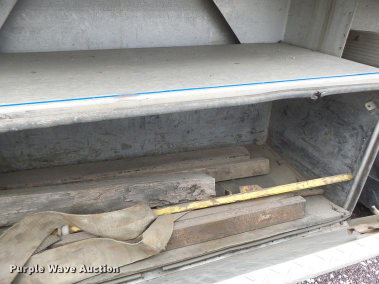 image for item DB9997 1990 East flatbed trailer