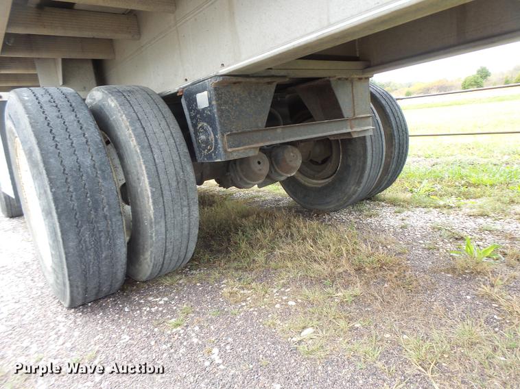 image for item DB9997 1990 East flatbed trailer