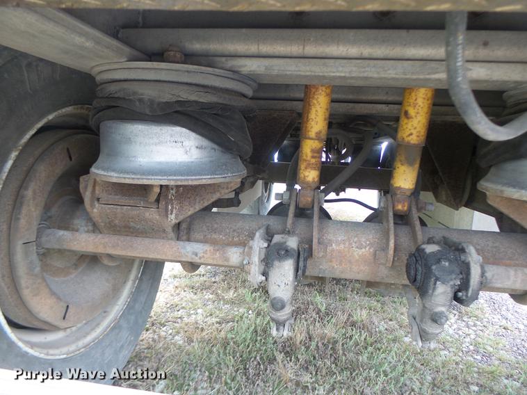 image for item DB9997 1990 East flatbed trailer