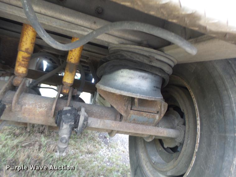 image for item DB9997 1990 East flatbed trailer